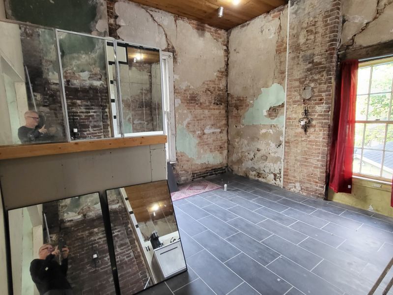 Original listing photo of Champion House bath tile room