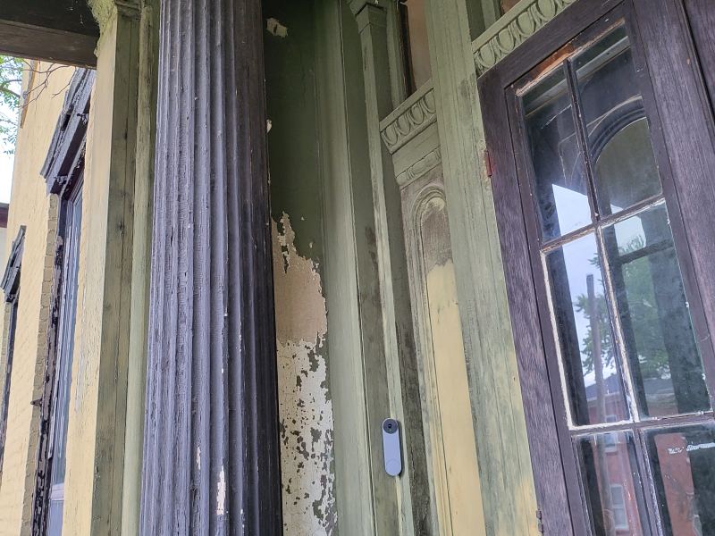 Original listing photo of Champion House exterior entry columns