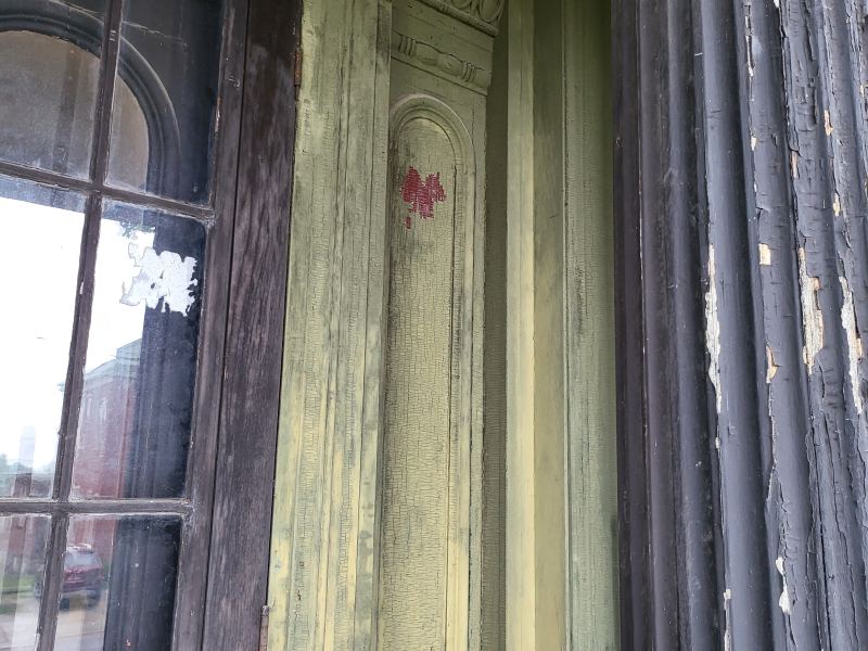 Original listing photo of Champion House porch column close up