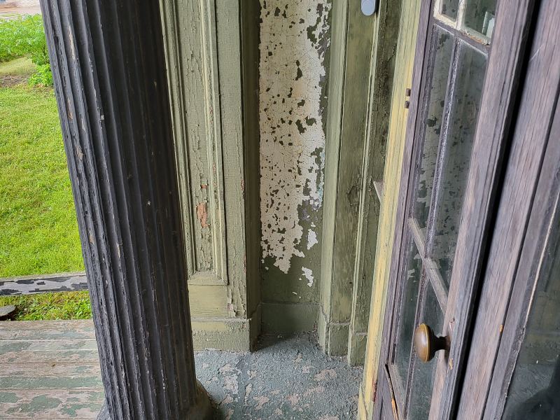 Original listing photo of Champion House doorway side trim